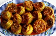 Alcachofas con tomate y cebolla