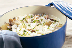 Arroz caldoso con cardos y almejas