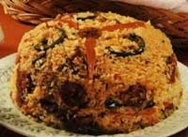 Arroz con chorizo y chicharrón