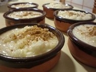 Arroz con leche, brandy, canela y manzanas