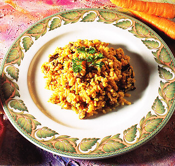 Arroz con verduras y menudillos de pollo