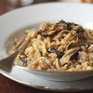 Arroz cremoso de setas con parmesano y trufa rallada