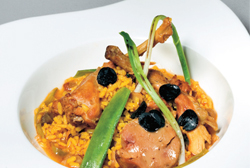 Arroz meloso de conejo, boletus, foie y láminas de trufa