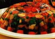 Aspic de verduras con salsa de pimientos