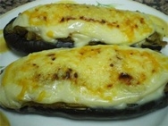 Berenjenas rellenas de pescado con salsa de mejillones