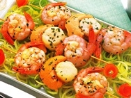 Brochetas de langostinos y vieiras