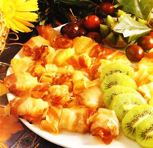 Brochetas de piña con panceta