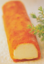 Canelón de turrón de crema y nata montada