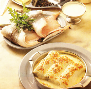 Canelones de merluza con alcaparras
