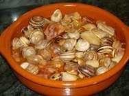 Caracoles con lechona