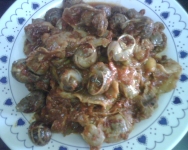 Caracoles con setas de cardo