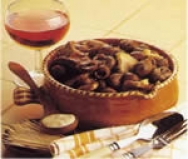 Caracoles de la huerta sobre puré de ortigas