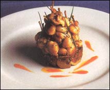 Caracoles y ancas de rana con sofrito de cebolla