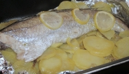 Cola de merluza con patatas panadera