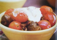 Coles de Bruselas con queso y tomates cherry