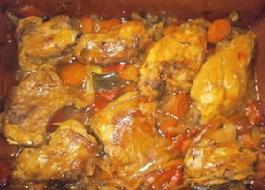 Conejo asado con mandarinas