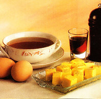 Consomé con flan de queso