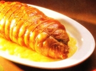 Cordero asado con compota de manzana