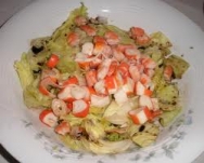 Ensalada de langostinos, gulas y berberechos