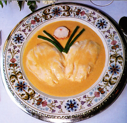 Escalopes de lubina con salsa de bogavante