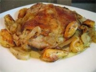 Espalda de cordero asada con puerros