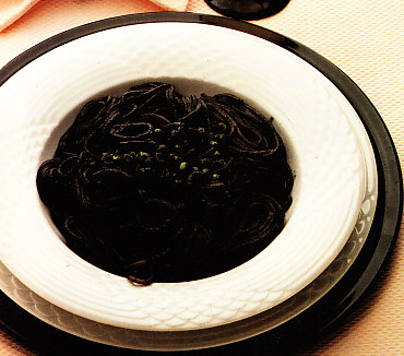 Fideos y guisantes con chipirones
