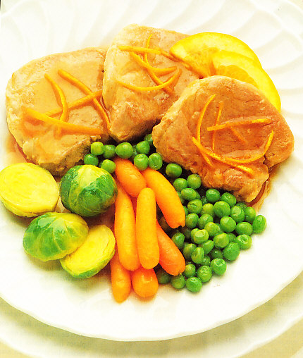 Filetes de cerdo con salsa de naranja