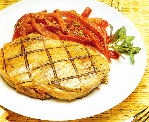 Filetes de vaca con pimientos rojos