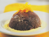 Fondant de chocolate con confitura de naranja y crema de vainilla
