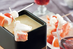 Fondue de queso al curry