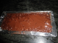 Hay que ponerle la capa de chocolate para tapar los cereales