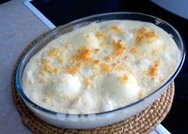 Huevos duros con bechamel y alcachofas rebozadas