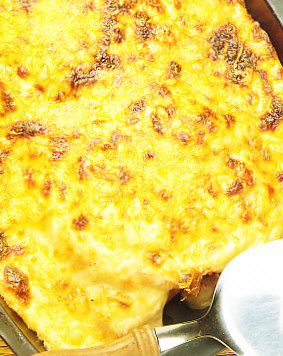Huevos fritos con bechamel