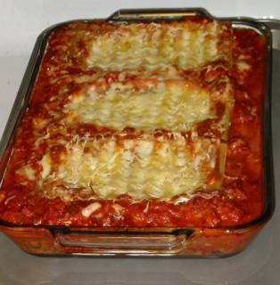 Lasaña con callos de bacalao,morcilla picantina y sepia