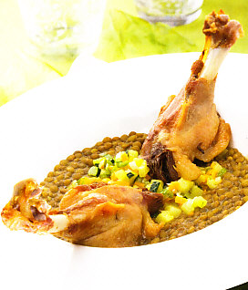 Lentejas con alas de pato confitadas
