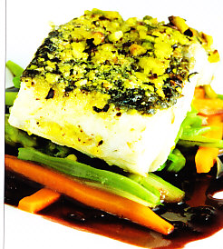 Lubina con costra de pistachos