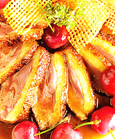 Magret de pato con cerezas