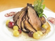 Magret de pato con uvas