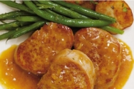 Medallones de solomillo de cerdo con salsa de naranjas