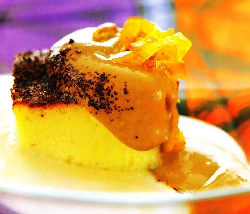 Pastel de queso manchego con crema de almendras, café y naranja
