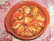 Merluza a la bilbaína con pimientos rojos