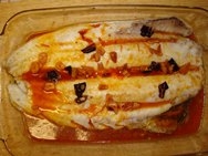 Merluza al horno con tomate