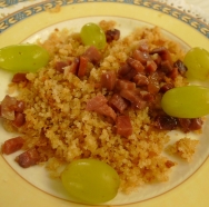 Migas con jamón y uvas