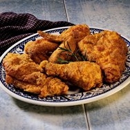 Muslos de pollo rebozados