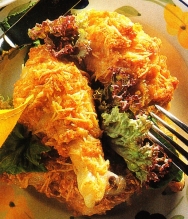Muslos de pollo rebozados con patatas chips