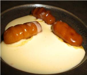 Natillas con buñuelos de viento