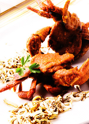 Nécoras en salsa con arroz salvaje frito