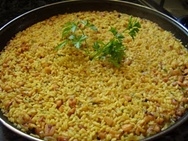 Paella oscura de pulpo