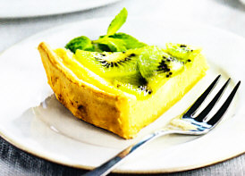 Pastel de queso y kiwi