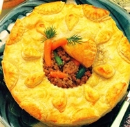 Pastel relleno de carne y verduras